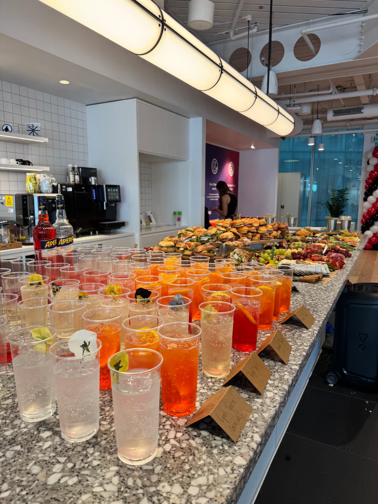 Cocktails being prepared at an office event bar